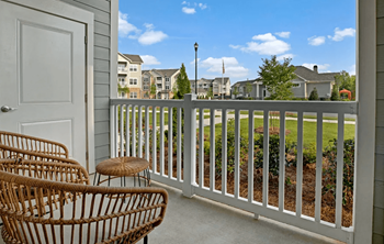 Outdoor Patio with two chairs at Ascent at Mallard Creek Apartment Homes, Charlotte, 28262